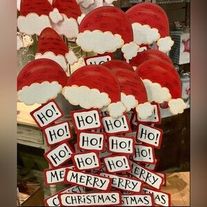 Festive Red and White Santa Hat Holiday Decor Metal Stake Hohoho Merry Christmas